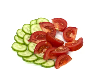 Tomatoes and cucumbers on white background 