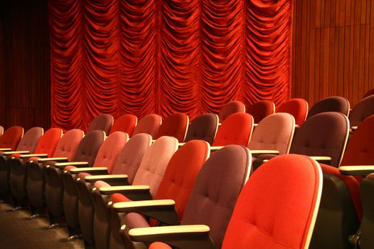 Row of seats in an empty theater