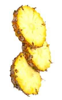 three ananas slices, isolated on white background, with light shadow 