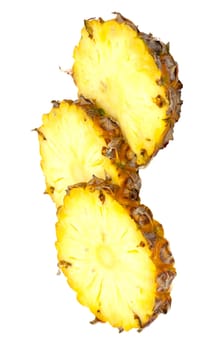 three ananas slices, isolated on white background, with light shadow 