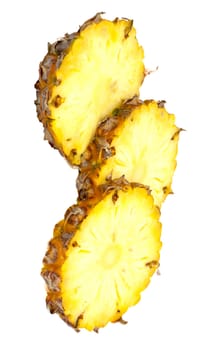 three ananas slices, isolated on white background, with light shadow 