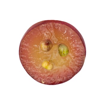 Translucent slice of red grape fruit, macro isolated on white 