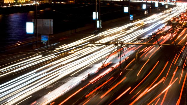 Cars with night lights at the evening