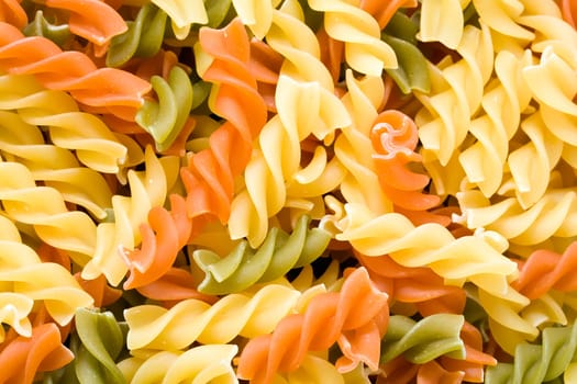 Raw italian pasta isolated on white background