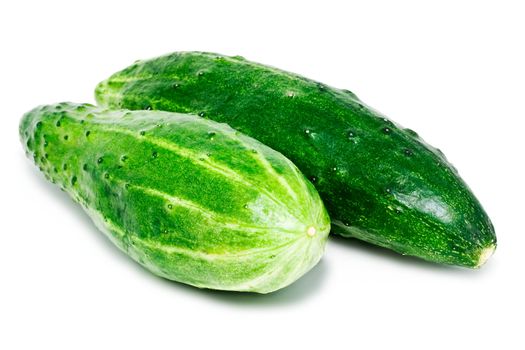 Green cucumbers isolated on white background