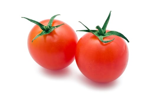 Fresh tomatoes isolated on white background