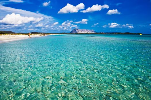 Sandy and sunny beach La Cinta in Sardinia, Italy