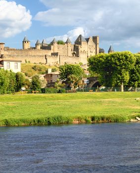 View of fortress Carcassonne (France, Languedoc), river Aude and Old bridge 