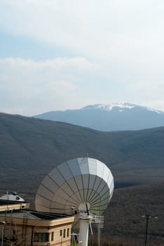 Beaming a signal in space to a satellite