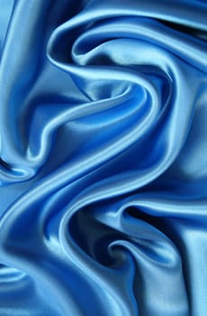 Smooth elegant dark blue silk can use as background 