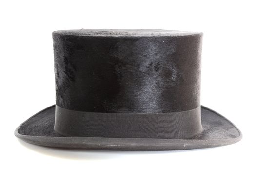 old black elegant topper hat over white background