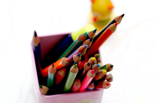 Few crayons on a white background