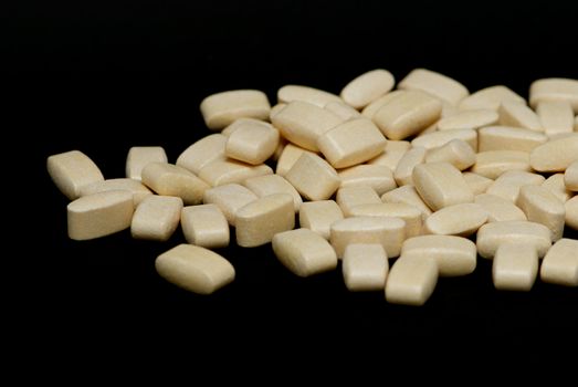 Pills on a black background