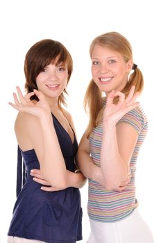 Two smilling girls are showing allright on white background
