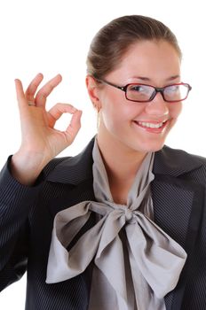 Young business woman is resturing alright sign. Isolated on white background.