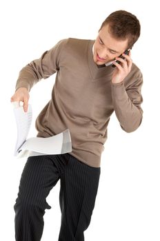 Man with mobile phone is looking in papers in a file on the run. Isolated on white background.