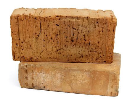 Two furnace brick are made from red clay