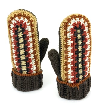 Two crocheted mittens on a white background
