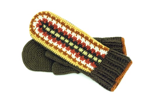 Two crocheted mittens on a white background