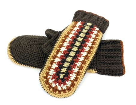 Two crocheted mittens on a white background