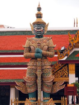 Giant guardian in the Temple of the Emerald Buddha, Bangkok,Thailand