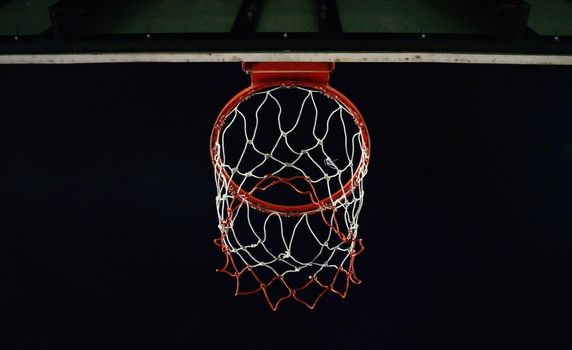 Basketball hoop with night sky background