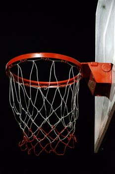 Basketball hoop with night sky background