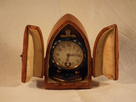 Old clock in wooden box