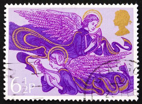 GREAT BRITAIN - CIRCA 1975: a stamp printed in the Great Britain shows Angels with Lute and Harp, Christmas, circa 1975