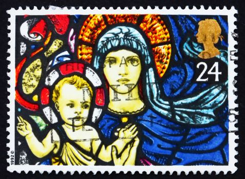 GREAT BRITAIN - CIRCA 1992: a stamp printed in the Great Britain shows Madonna and Child, Stained Glass Window, Christmas, circa 1992