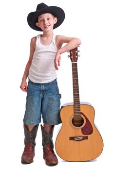 Cute young man with a cowboy hat and oversize boots