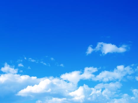 Blue sky with clouds and sun