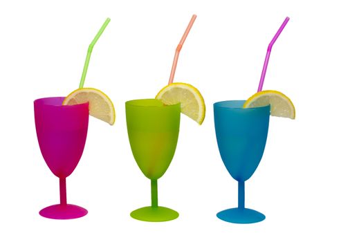 cocktail glasses with straw and lemons isolated on white