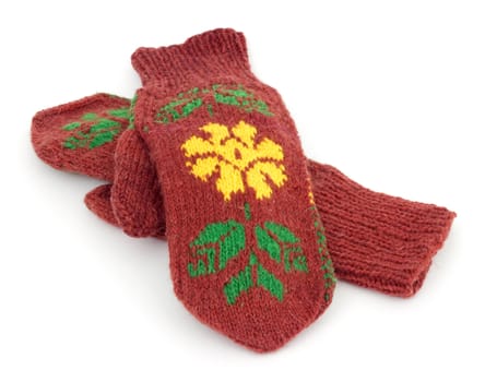 Two crocheted mittens on a white background
