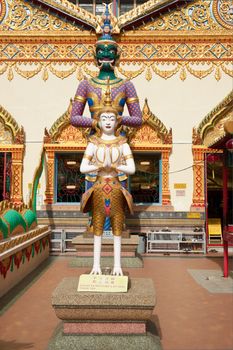 statues outside ornate hindu temple in penang