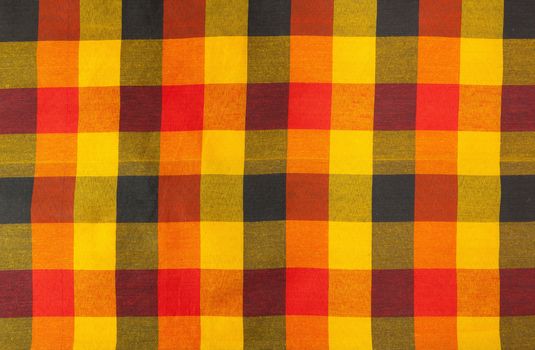colorful plaid fabric pattern as the background