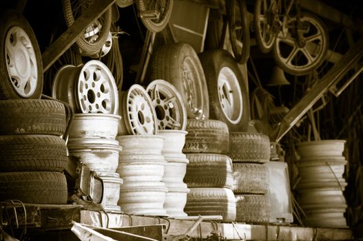 Metal second hand shop with used wheels and tyres