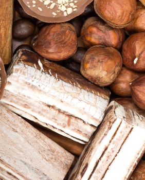 coffee beans, cinnamon and nuts background