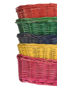 stack of isolated on white woven straw baskets