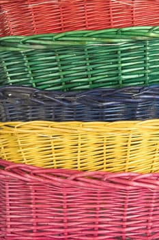 stack of isolated on white woven straw baskets