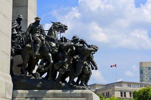 The National War Memorial (also known as The Response), is a granite cenotaph with bronze sculptures, that stands in Confederation Square, Ottawa, Canada and serves as the federal war memorial for Canada.