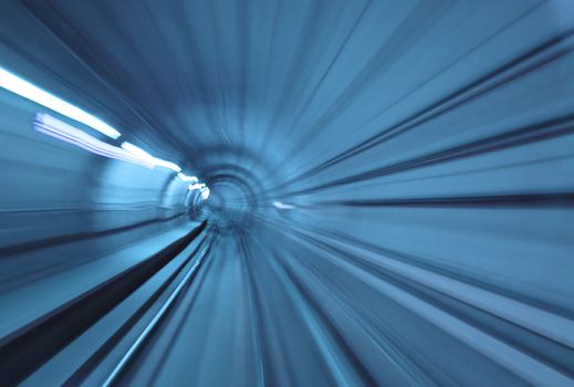 Abstract blue tunnel with motion blur at high speed