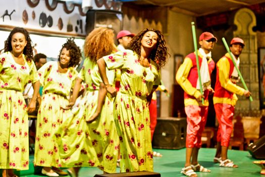 ADDIS ABABA, ETHIOPIA – August 2 - Dancers and musicians perform the traditional dances of different ethnic groups of Ethiopia at a local restaurant on August 2, 2012 in Addis Ababa, Ethiopia