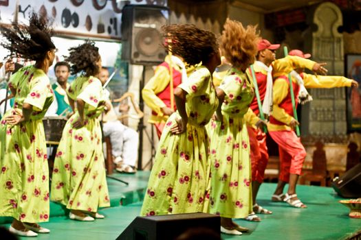 ADDIS ABABA, ETHIOPIA – August 2 - Dancers and musicians perform the traditional dances of different ethnic groups of Ethiopia at a local restaurant on August 2, 2012 in Addis Ababa, Ethiopia