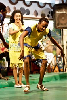 ADDIS ABABA, ETHIOPIA – August 2 - Dancers and musicians perform the traditional dances of different ethnic groups of Ethiopia at a local restaurant on August 2, 2012 in Addis Ababa, Ethiopia