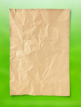 Old grunge paper on green nature background