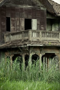 abandoned old house with grass in Thailand