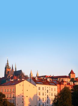 View of Prague city at dawn under blue sky with St. Vitus Cathedral in left side. Europe, Czech Republic