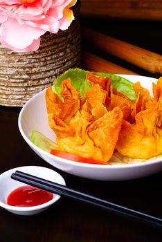 Fried wantons on the background asia food