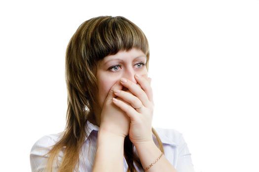 frightened young woman on a white background